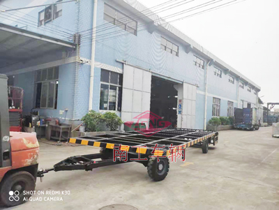 1675216397466431.jpg 8噸無動(dòng)力牽引骨架平板拖車帶護(hù)欄3I.jpg
