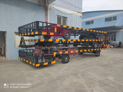 1675216430524731.jpg 8噸無動(dòng)力牽引骨架平板拖車帶護(hù)欄4I.jpg